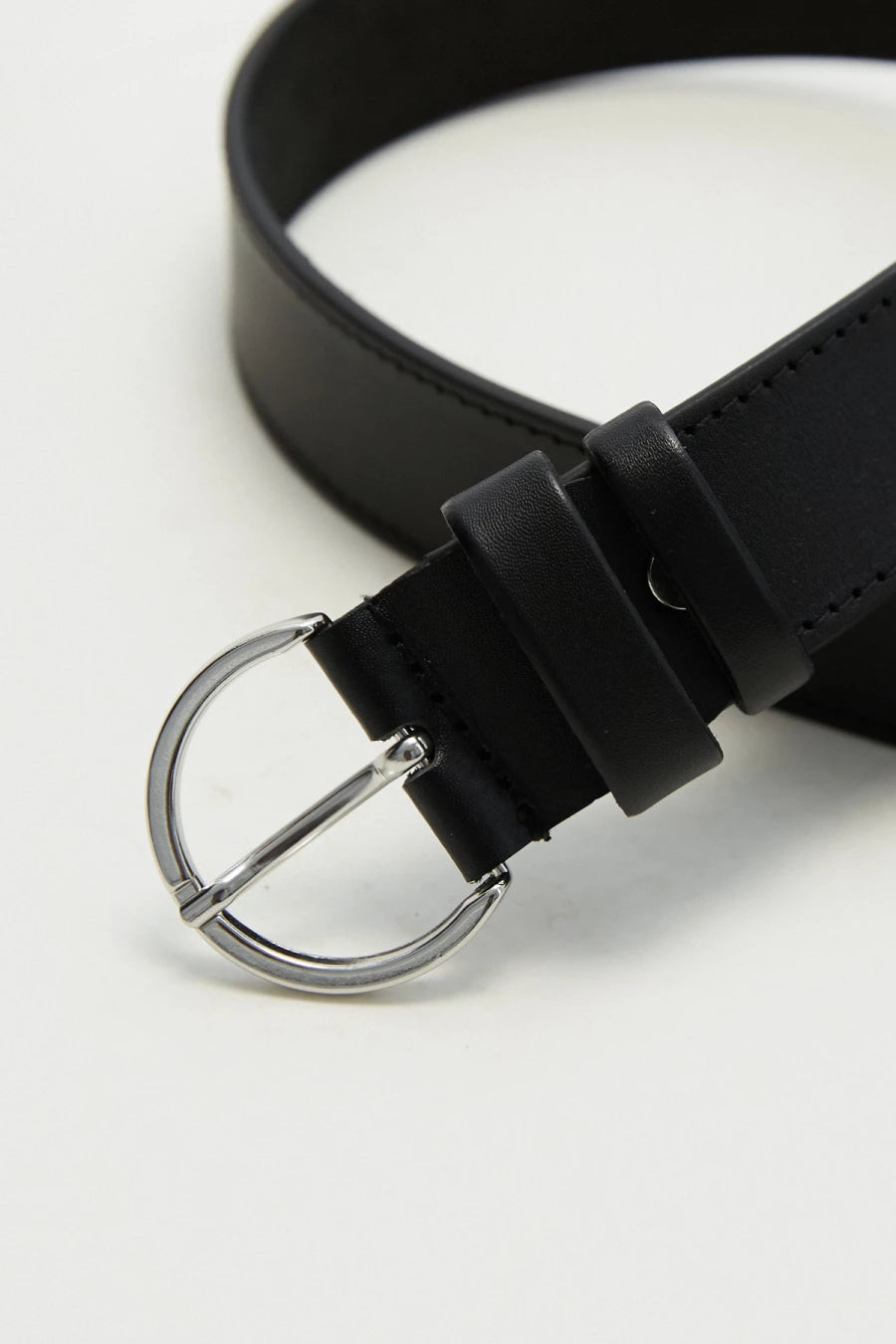 Black leather belt with semicircular silver buckle