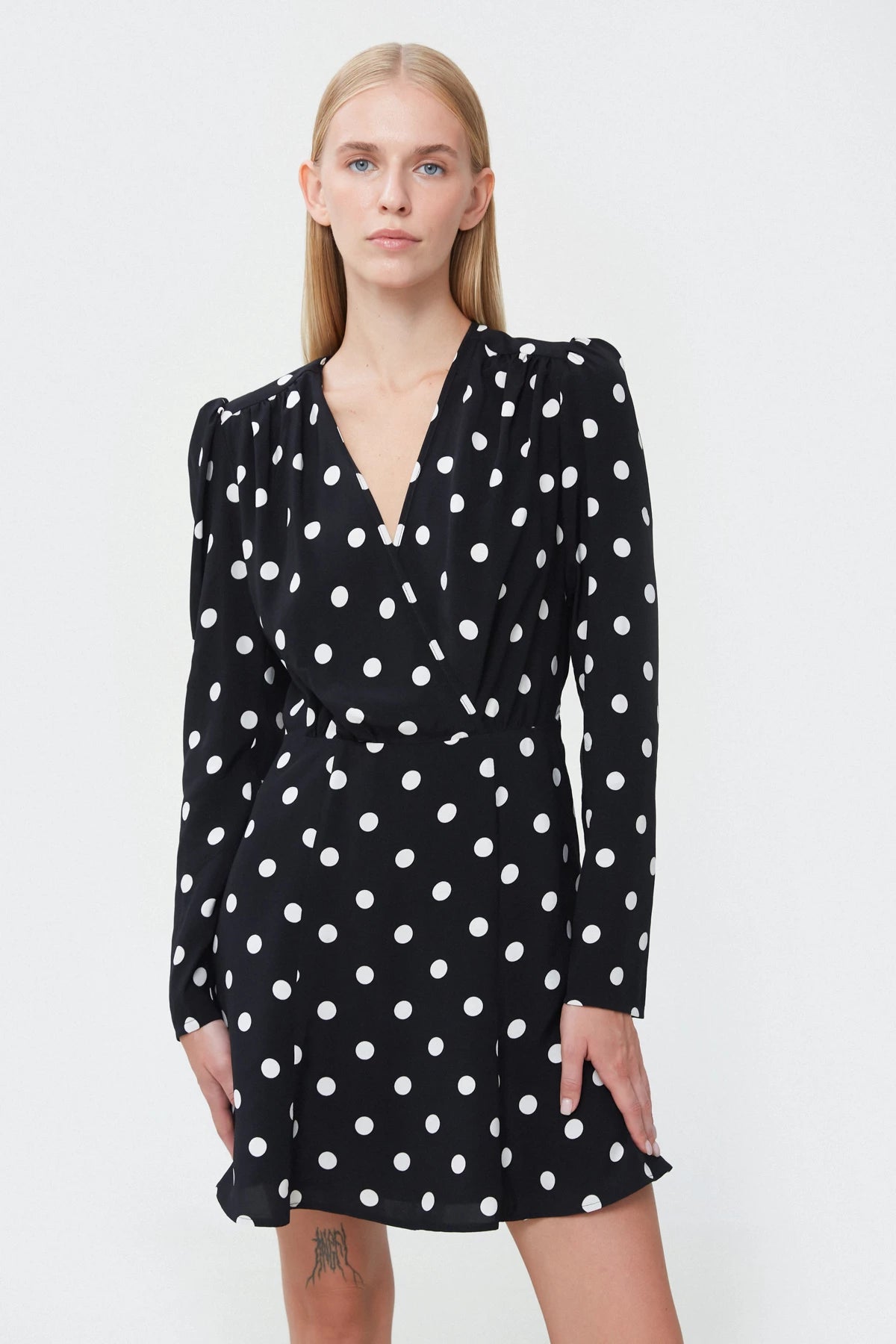 Short black viscose dress with polka dot print