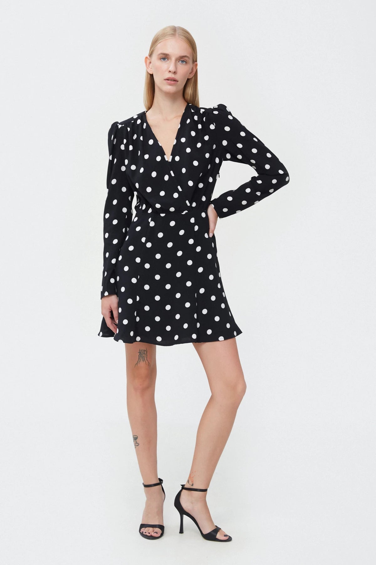 Short black viscose dress with polka dot print