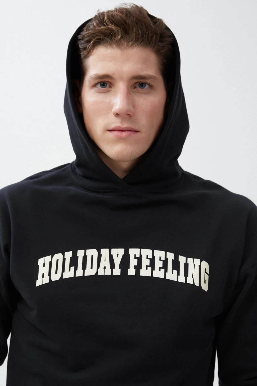 Black unisex hoodie "Holiday feeling" on fleece