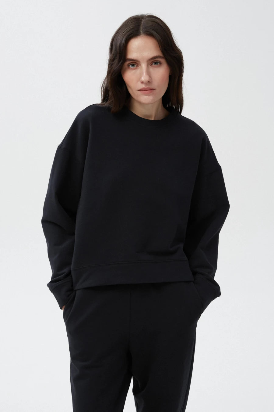 Black sweatshirt of knitwear on fleece