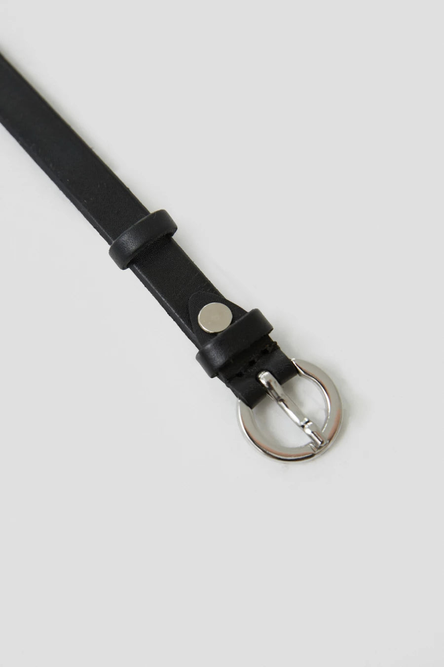 Black leather belt with semicircular silver buckle