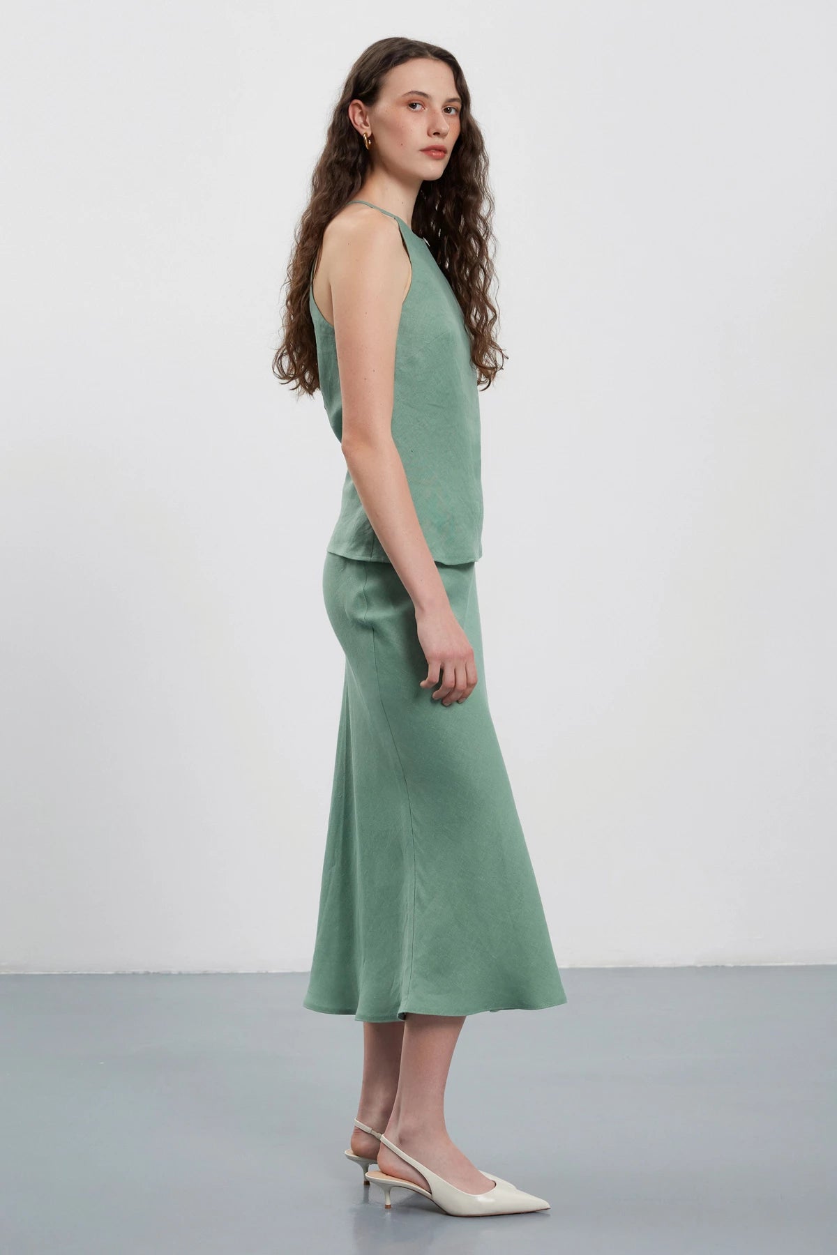 Olive green midi length skirt made of 100% linen