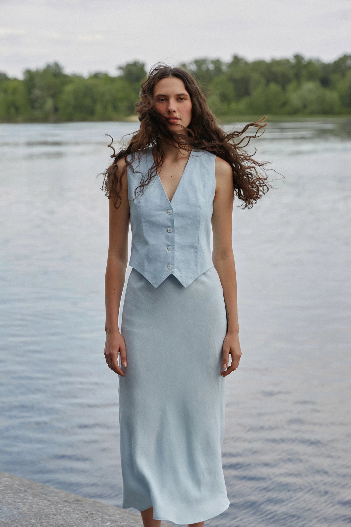 Light blue midi length skirt made of 100% linen