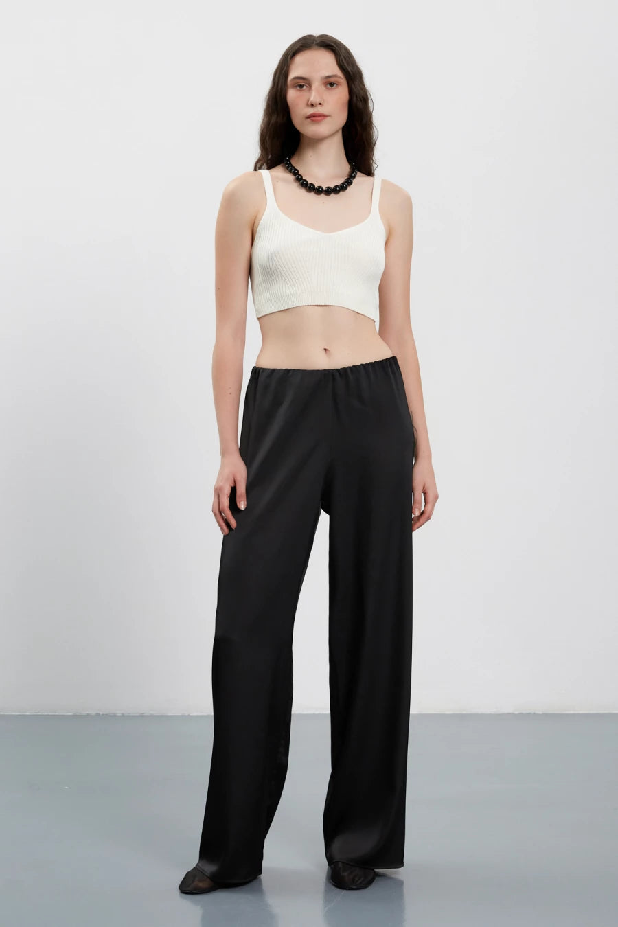 Straight-cut black satin pants