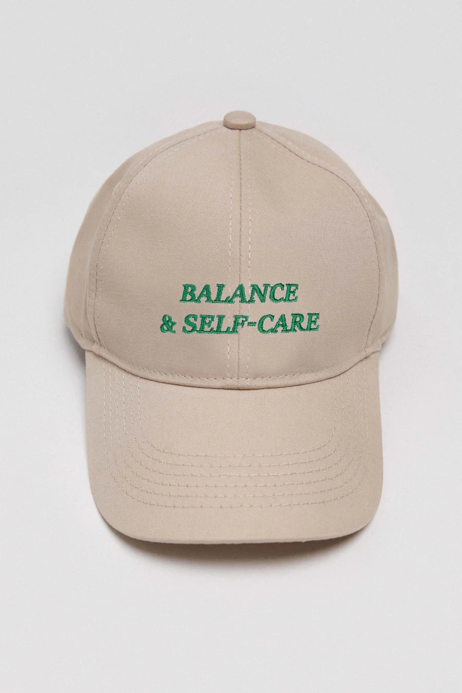 Beige baseball cap "Balance & self-care"