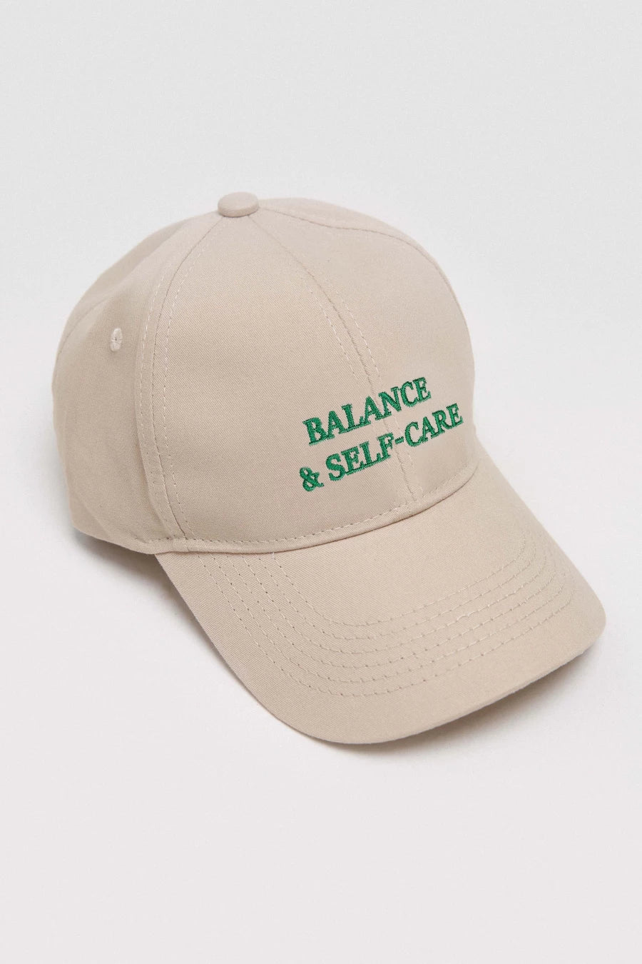 Beige baseball cap "Balance & self-care"