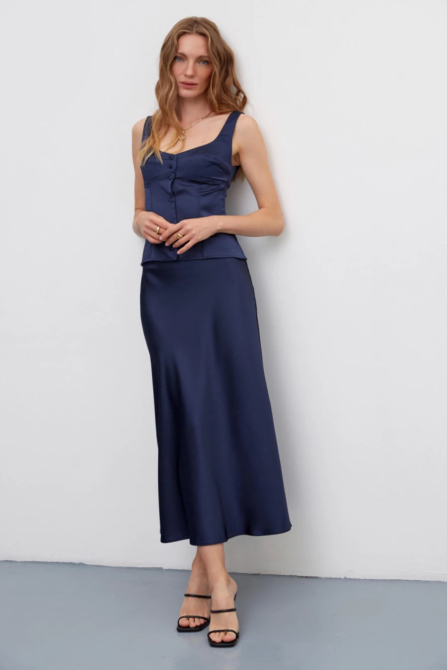 Dark blue long midi skirt made of dense satin