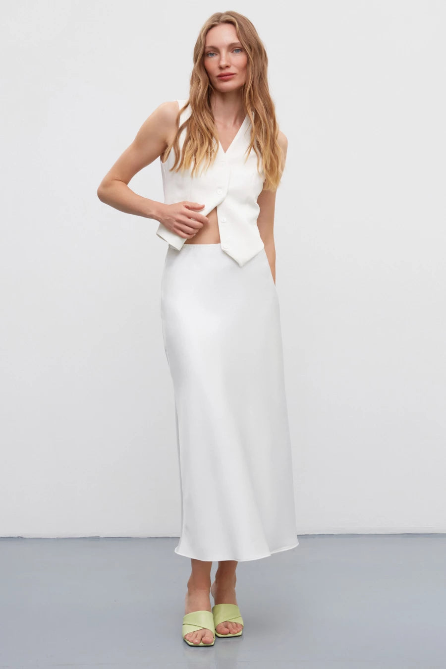 White long midi skirt made of dense satin