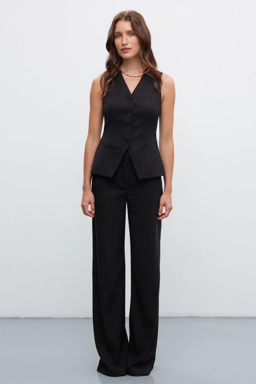 Black elongated straight pants with viscose