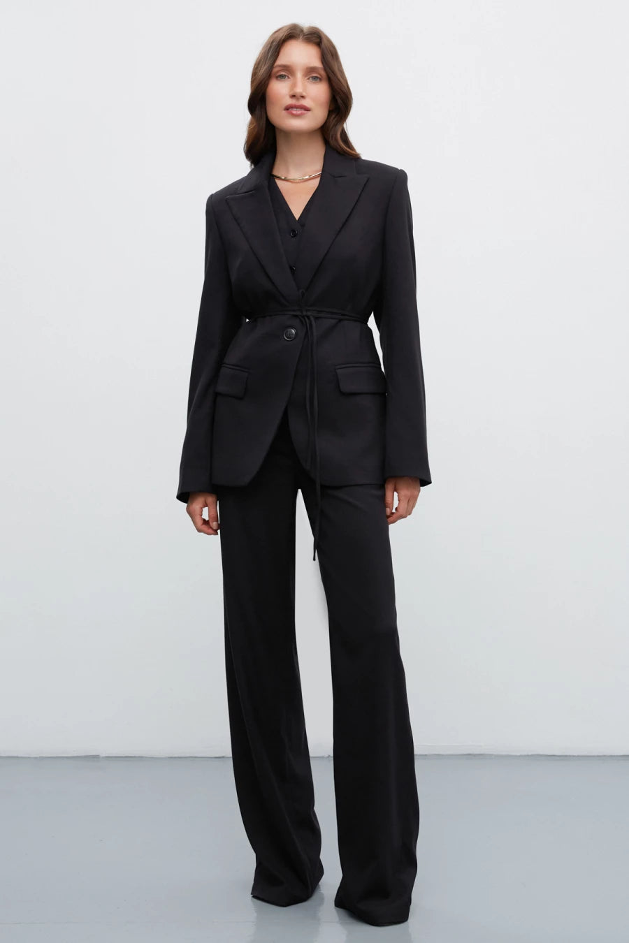 Black elongated straight pants with viscose