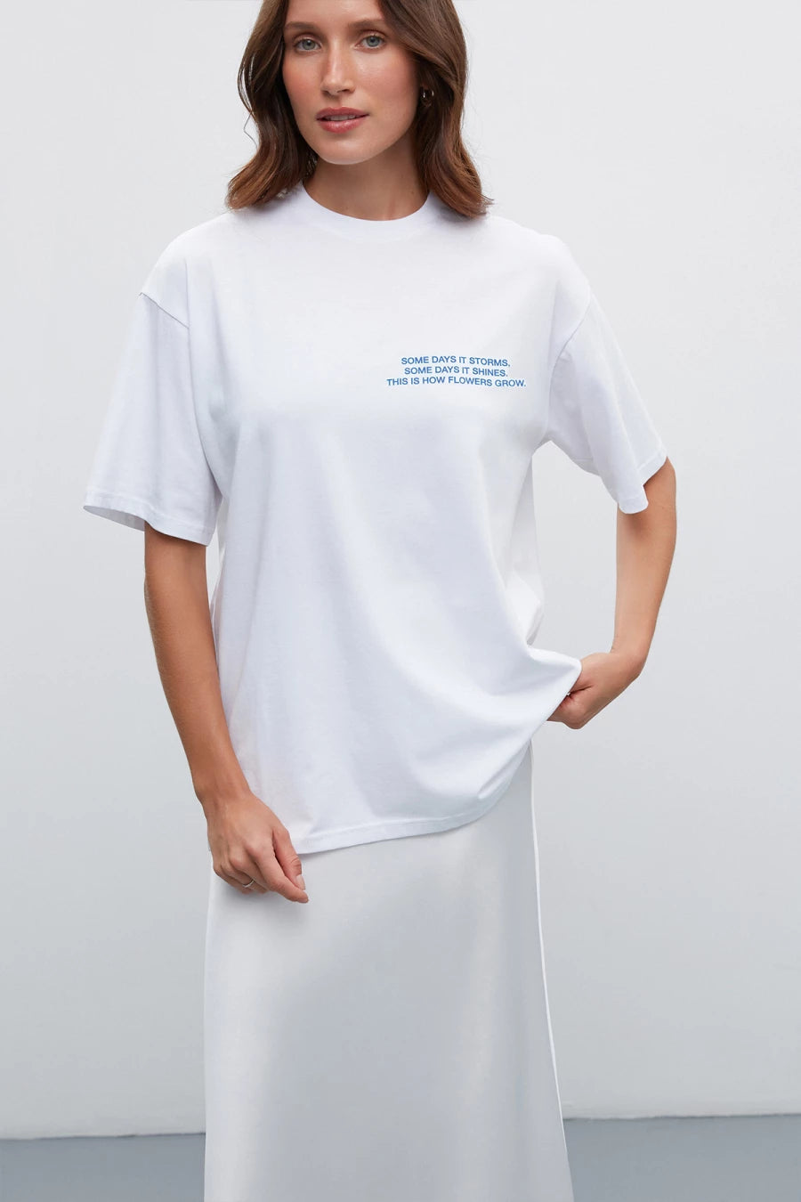 White T-shirt with cotton "Some days it storms"