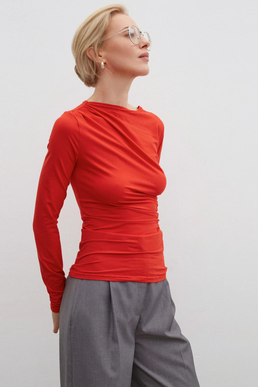 Red knitted jumper with drape