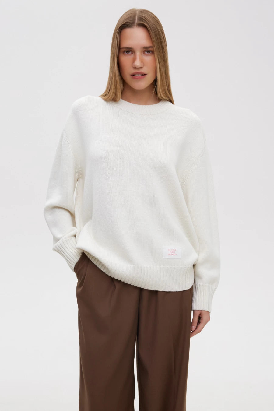 Milky sweater "Be your first priority" with wool