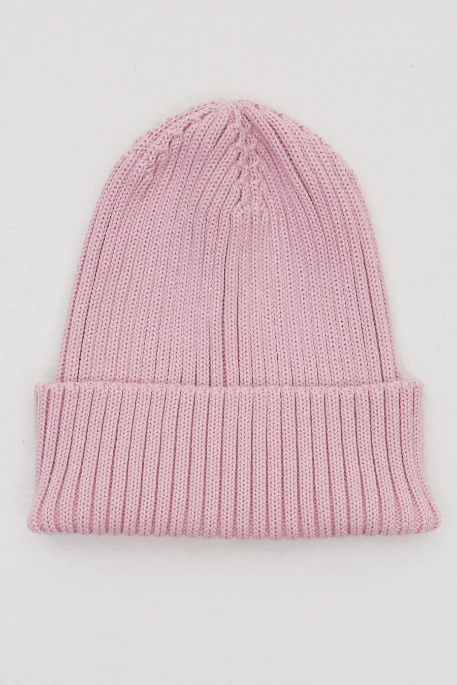 Soft pink knitted beanie hat with merino wool