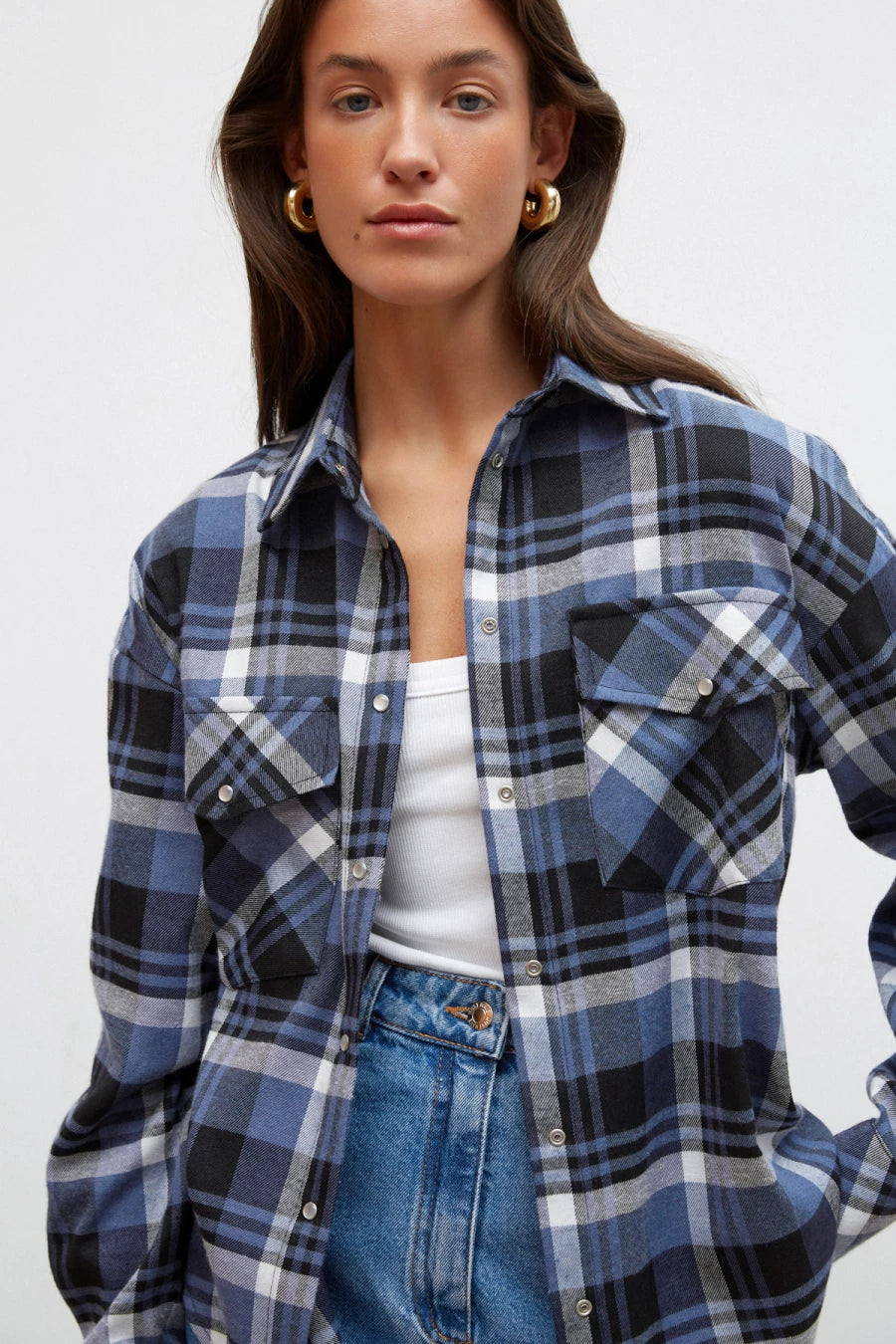 Black and blue checked flannel shirt with a loose silhouette