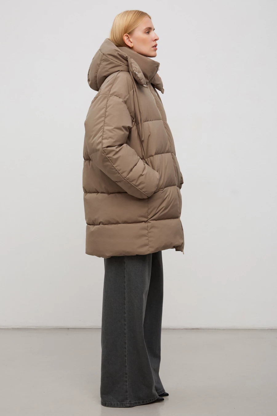 Dark beige elongated quilted jacket with insulation