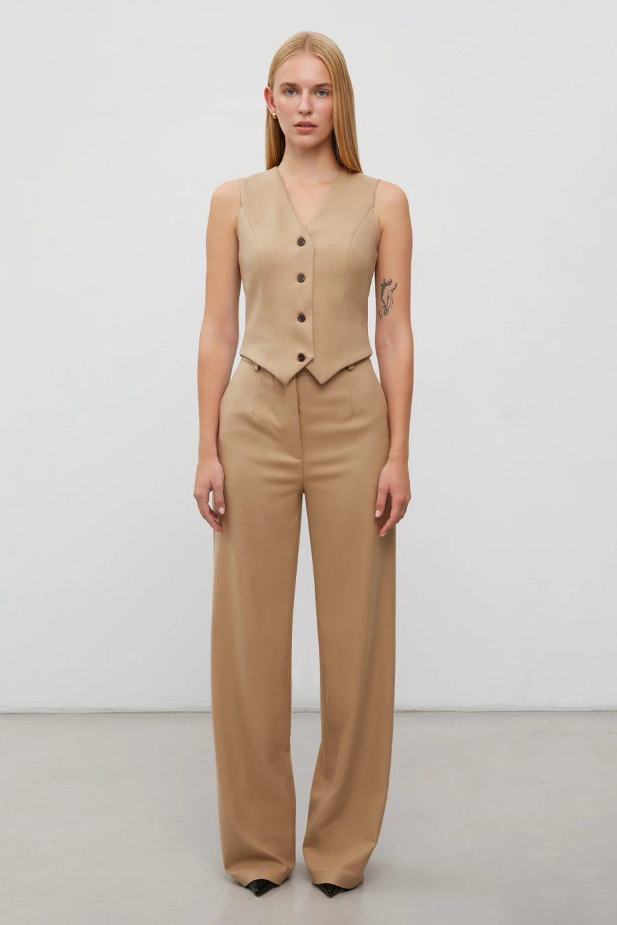 Beige elongated straight pants with viscose