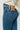 Blue elongated flared jeans with a high rise