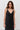 Black satin dress with asymmetrical seams
