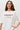 Milky T-shirt made of dense knitwear "PERFECT IS BORING"