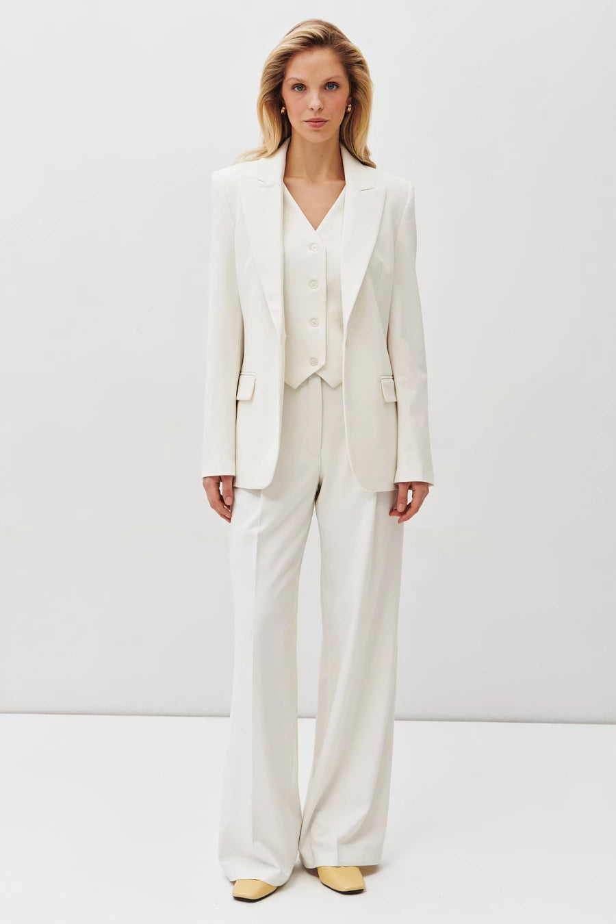 Cream single-breasted jacket with self-belt